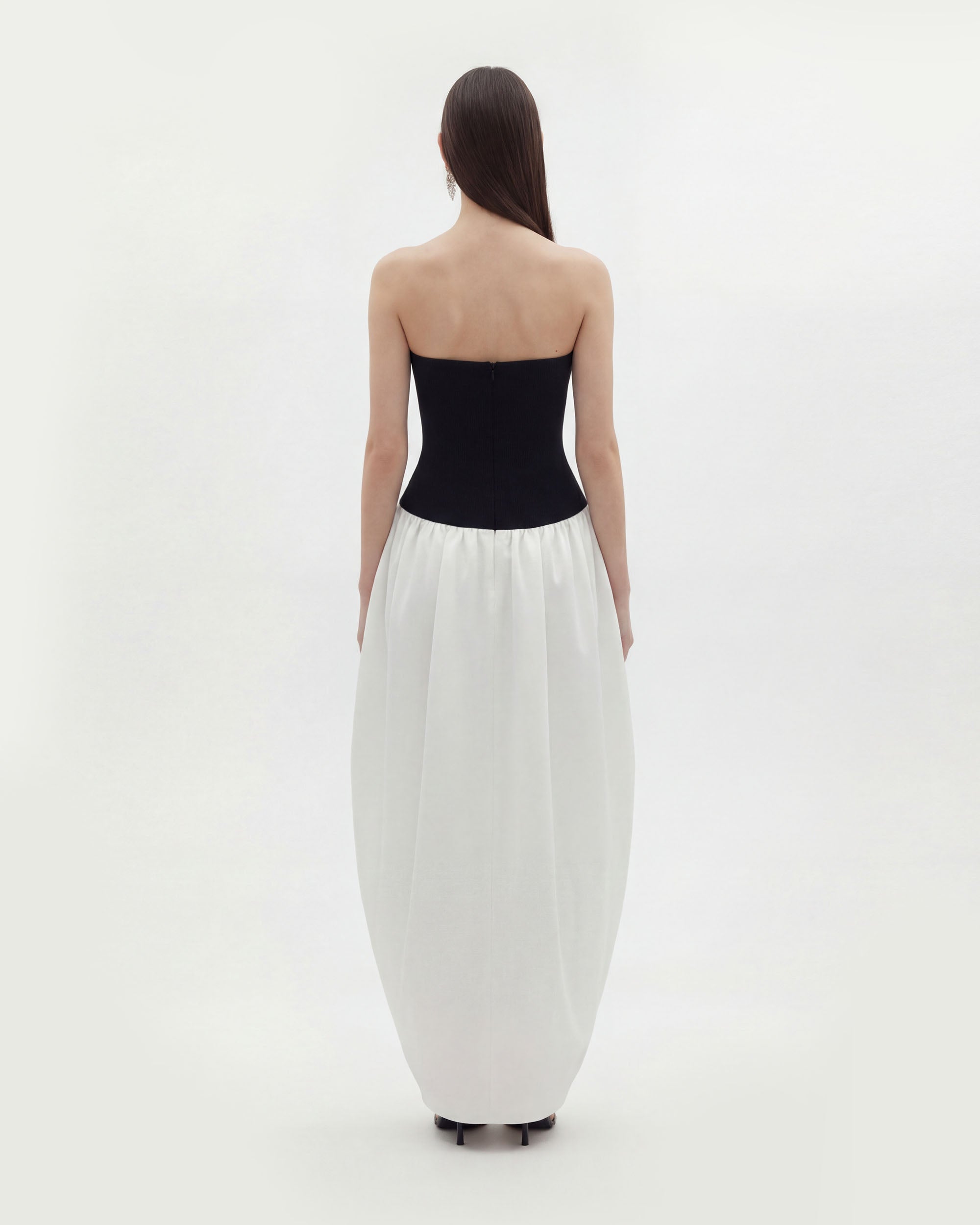 Paneled detail of strapless sculptural maxi dress
